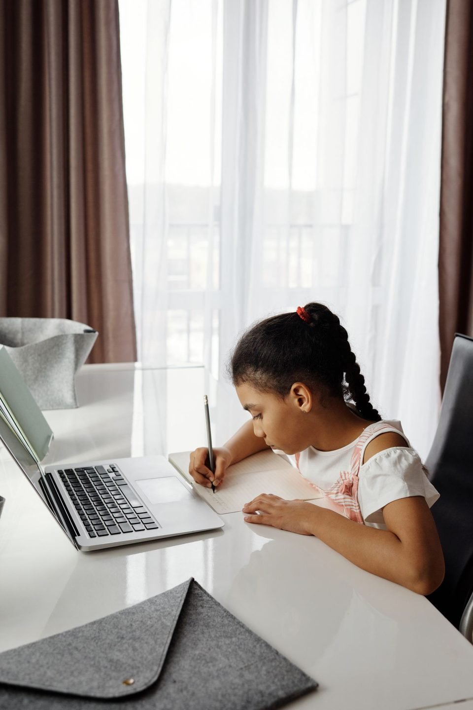 A student working independently during an online lesson